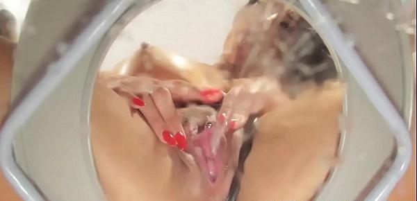  Pissing mistress spreading her pierced pussy